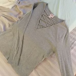 Long sleeved criss cross chest